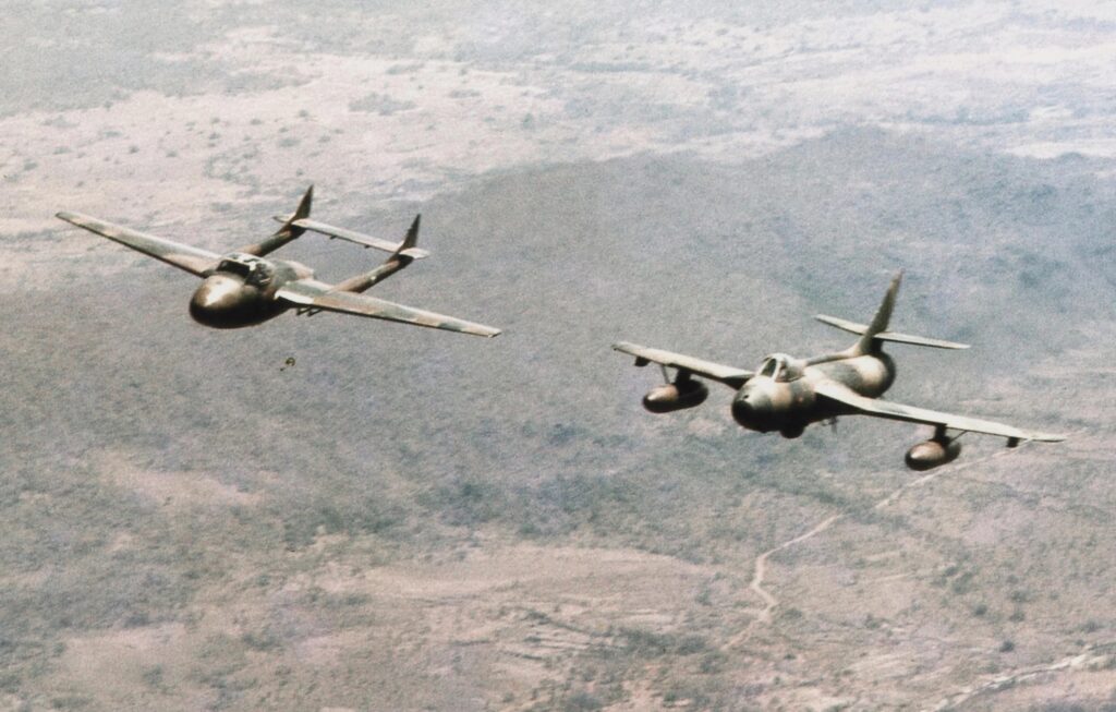 The Hawker Hunter and Rhodesia’s Bush War 6 A Hunter with a two-seat Vampire over the pestilential Zambezi Valley in about 1972 as nationalist incursions increased