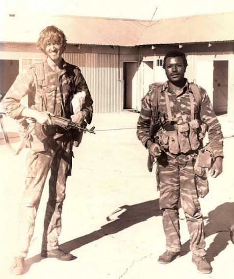 John Gartner and Steven Mpofu 1 John Gartner and Steven Mpofu about to deploy on a recce task. Both men appear to be wearing Portuguese Lizard Stripe camouflage which would indicate this operation was in Mozambique.