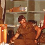 Derek is shown at the Para School at Bloemfontein, South Africa.