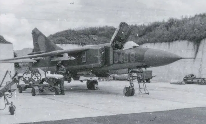 MiG-23ML C-408 in a revetment at AFB Lubango.Two R-60 missiles are loaded on the belly pylons