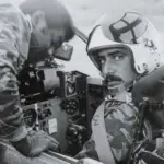 Capt Raul Rubio strapping into the front seat of a MiG-23UB for a night-training flight during March 1986